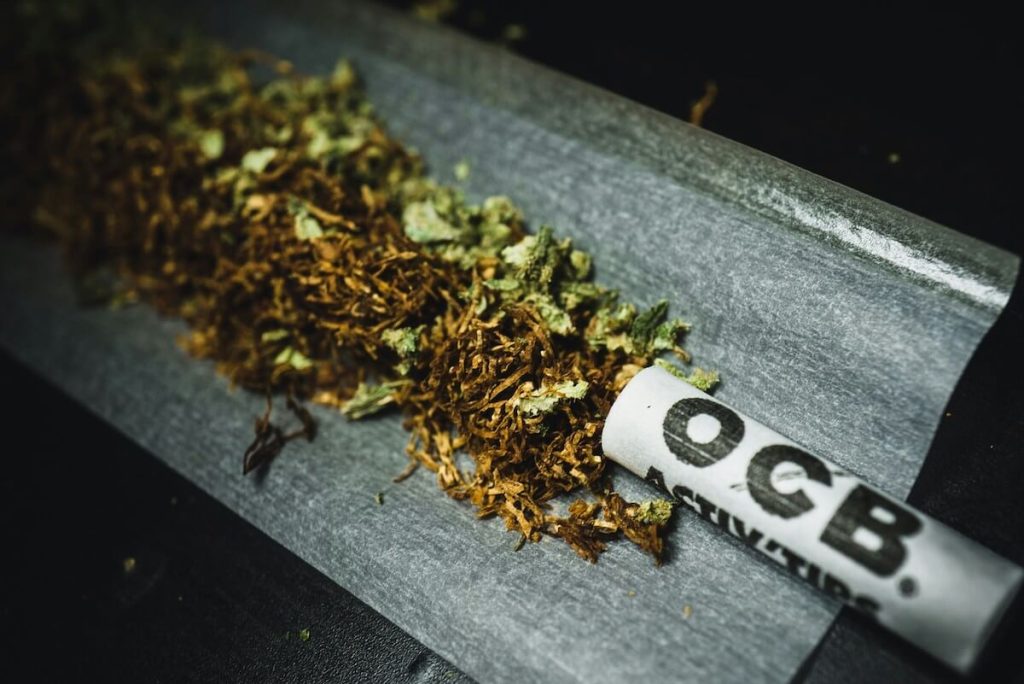 mix of tobacco and cannabis on a paper with a charcoal filter